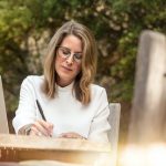 California estate tax, image of business woman working outside