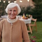 California statutory probate fees, image of senior woman standing and smiling at camera