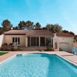 put your home in a trust, image of house with pool