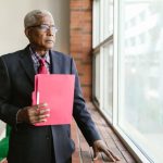 living trust, image of businessman in a suit holding a folder