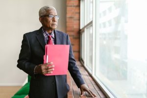 living trust, image of businessman in a suit holding a folder